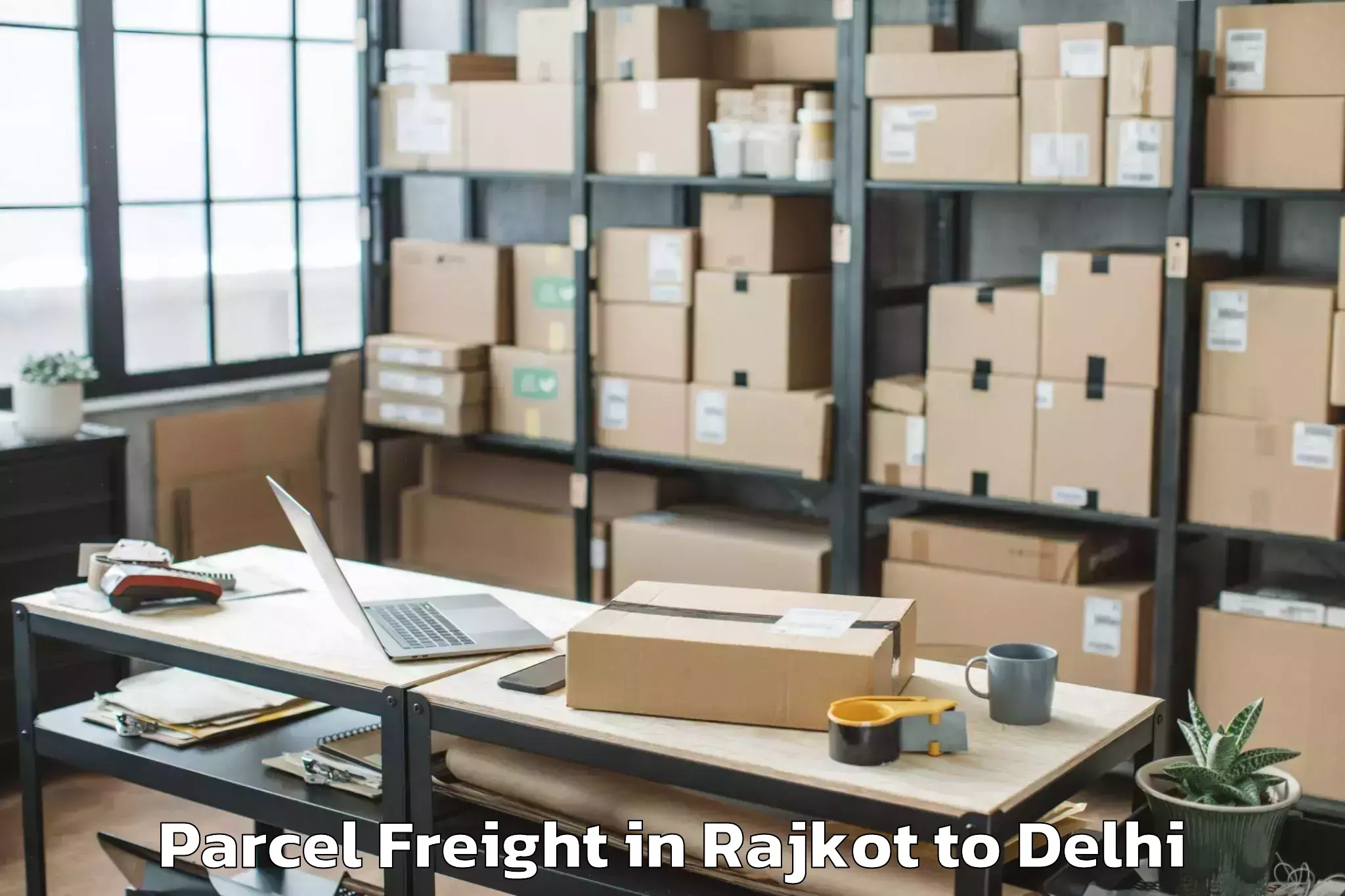 Affordable Rajkot to Unity One Janakpuri Mall Parcel Freight